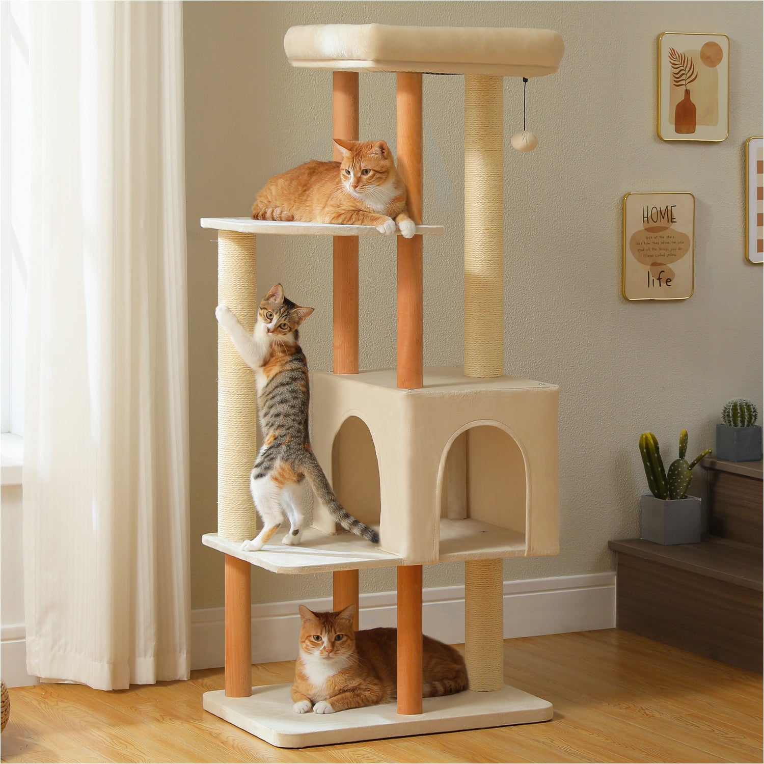 Brown and beige wooden cat tree with padded top perch, double-entry condo, sisal scratching posts, and cats resting at multiple levels