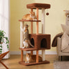 135 cm wooden cat tree with spacious condo, padded top perch, natural wood posts, sisal scratching posts, and cats in a living room