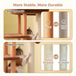 Close-up of natural wood support posts and fully sisal-wrapped scratching posts on a brown and beige cat tree