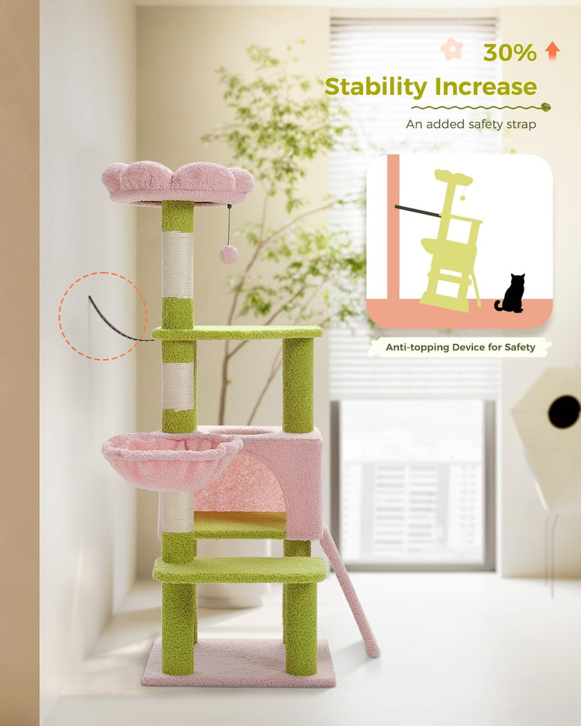 Green and pink cat tree with stability increase feature in a room setting.