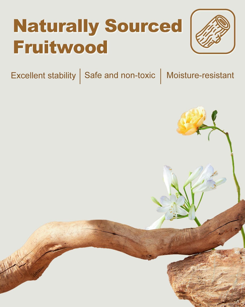 Advertisement for naturally sourced fruitwood with a piece of wood and flowers on a light background.