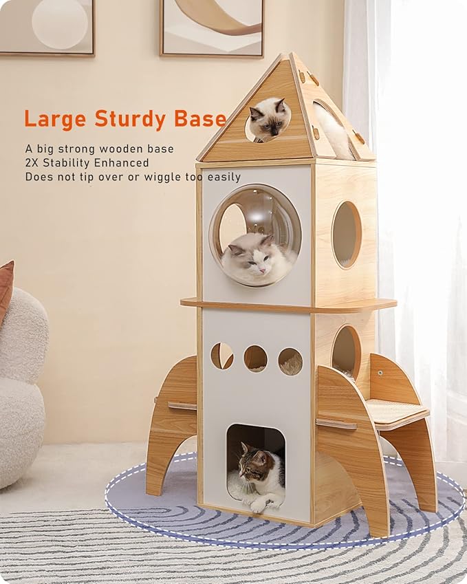 Three cats hiding inside a large wooden cat tree with a sturdy base.
