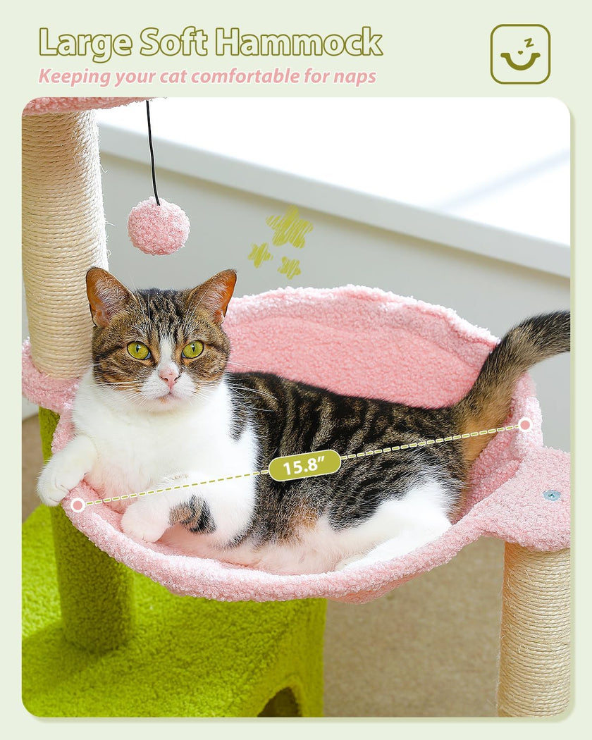 Cat sitting on a large soft hammock with a green base and pink cushion, labeled 'Large Soft Hammock'.