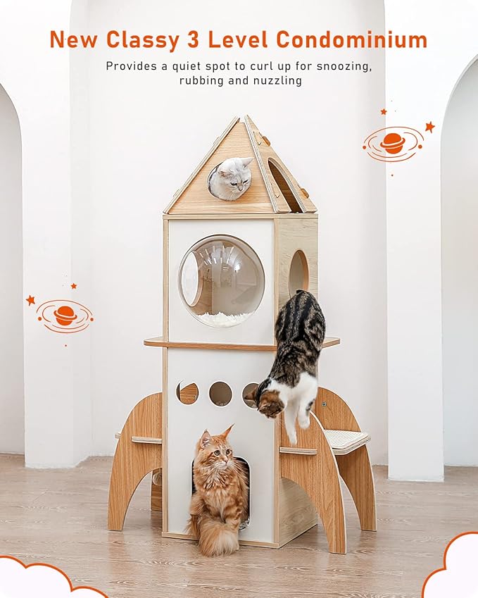 Wooden cat condo with 3 cats on a light wood floor. Unique rocket ship NASA themes cat tree