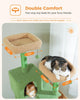 Two cozy cats lounging atop the dual top beds of a modern green cat tree by Catopia Co., a Canadian local business that ships only within Canada. This stylish cat tower features plush perches and textured scratch posts, perfect for a multi-cat household seeking luxury cat furniture with elevated comfort.