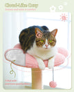 Cat sitting on a pink cushion with text about cloud-like coziness and premium fibers.