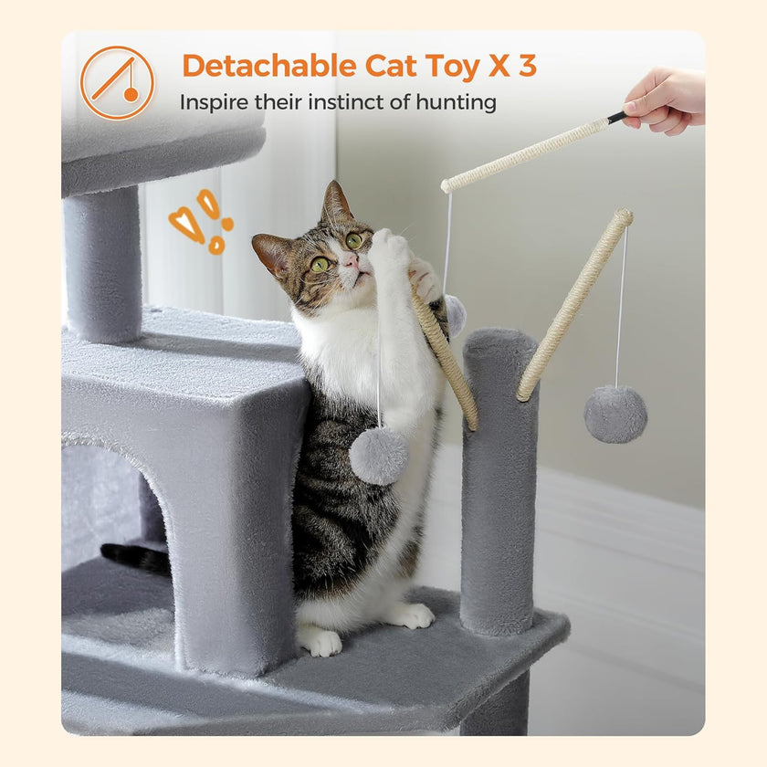 Cat playing with a detachable cat toy on a cat tree