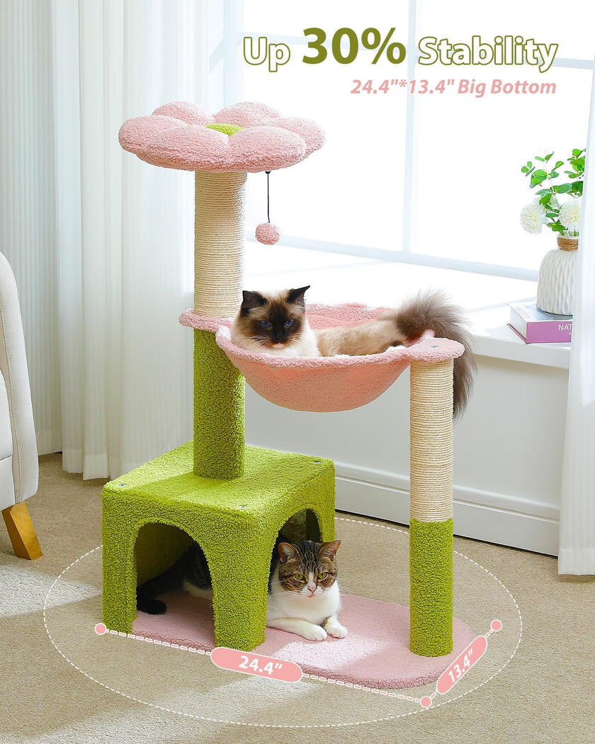 Cat playing on a green and pink cat tree with stability information displayed.