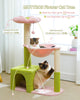 Cat tree with pink flower perch and green base, featuring two cats on a light-colored floor.