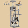 Catopia Co.'s grey cat tower beside a couch, blending perfectly with modern home interiors. Multi-level design supports playful and restful cat activities. Canadian local business, ships only within Canada.