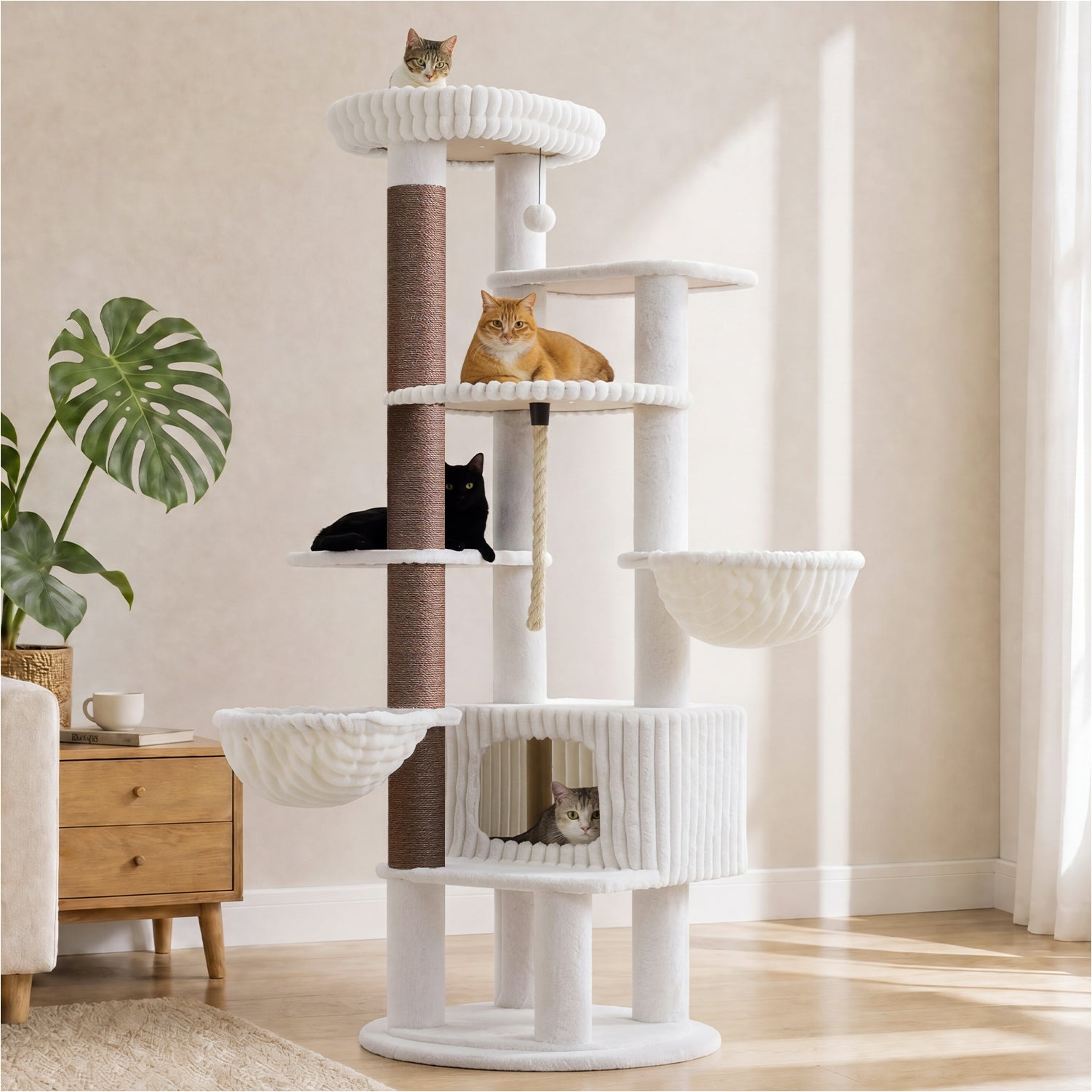 White 188 cm tall cat tree with two hammocks, large condo, padded top perch, and sisal scratching post in a bright living room