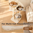 Three cats relaxing in plush-lined rattan baskets on a white multi-level cat tree for multi-cat households