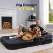 Large golden retriever relaxing with owner on unfolded grey XL foldable dog bed
